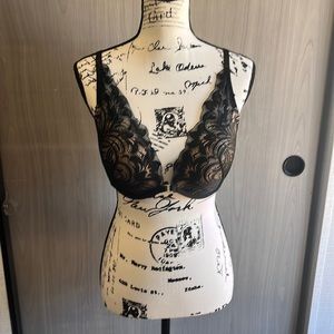 Nude and black lace bra